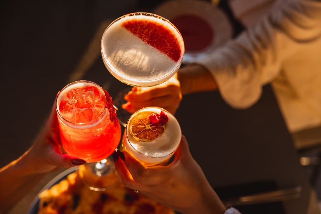 Cheers with signature cocktails at Central Beach Split