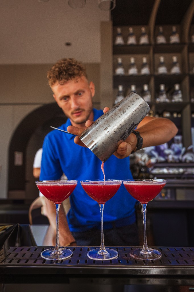 Bartender pouring cocktails at Central Beach Split